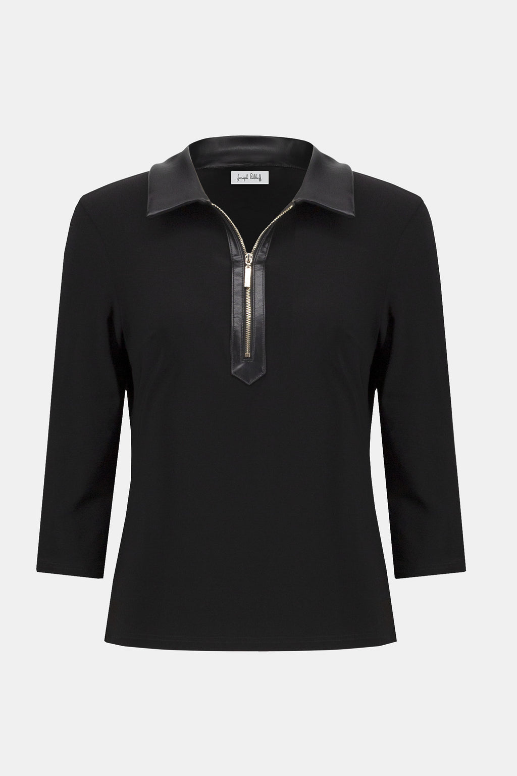 Pearls Boutique Port Dover Ontario Joseph Ribkoff Silky Knit and Leatherette Fitted Top. colour Black Fitted silhouette designed to contour and flatter
Silky knit fabric with a soft, fluid feel
Bold shirt collar with leatherette detailing for modern sophistication
Front placket with zipper accent for a sleek, contemporary edge
Three-quarter sleeves offering a balanced, polished look
Unlined for lightweight, effortless wear