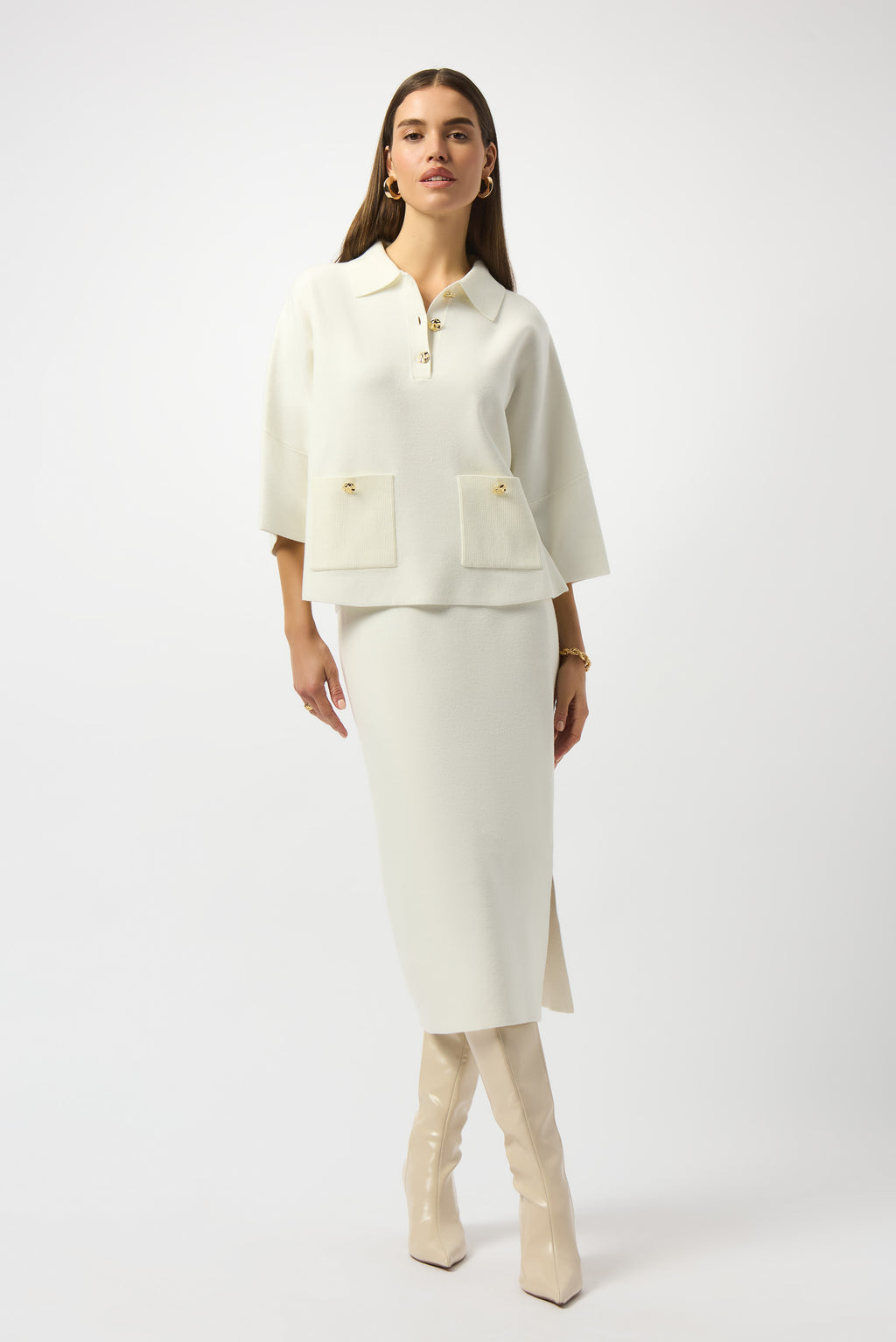 Pearls Boutique|Port Dover Ontario| Joseph Ribkoff | Sweater Knit Boxy Pullover With Polo Collar|253962. Winter white colour. Soft sweater knit pullover featuring a structured boxy fit with a chic polo collar, gold button accents on the placket and front pockets, and elegant three-quarter bell sleeves for a feminine, fluid silhouette.