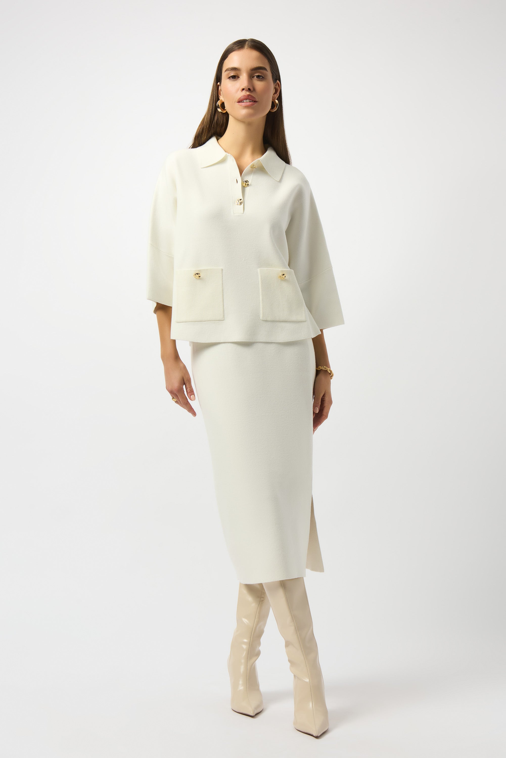 Pearls Boutique|Port Dover Ontario| Joseph Ribkoff | Sweater Knit Boxy Pullover With Polo Collar|253962. Winter white colour. Soft sweater knit pullover featuring a structured boxy fit with a chic polo collar, gold button accents on the placket and front pockets, and elegant three-quarter bell sleeves for a feminine, fluid silhouette.