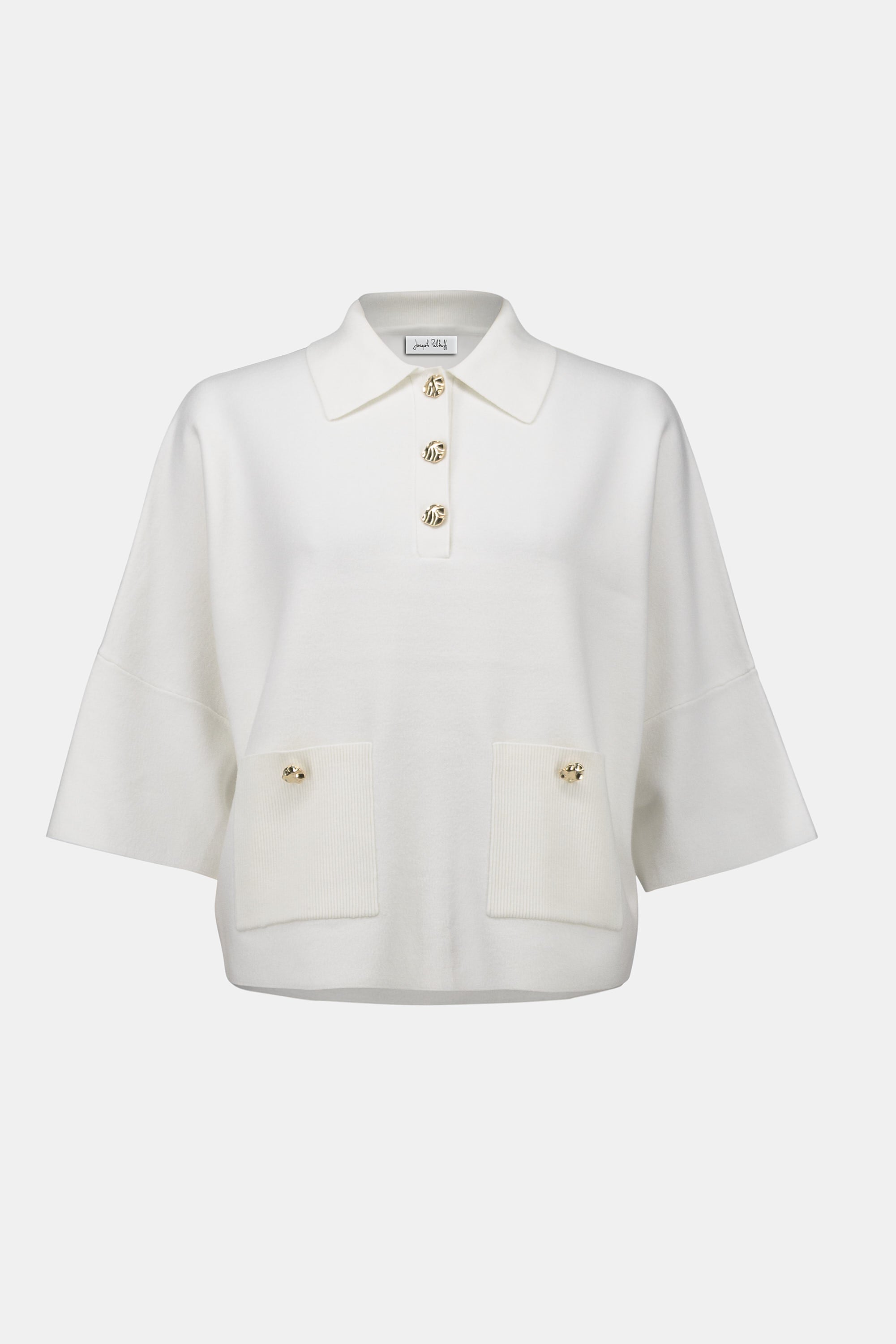 Pearls Boutique|Port Dover Ontario| Joseph Ribkoff | Sweater Knit Boxy Pullover With Polo Collar|253962. Winter white colour. Soft sweater knit pullover featuring a structured boxy fit with a chic polo collar, gold button accents on the placket and front pockets, and elegant three-quarter bell sleeves for a feminine, fluid silhouette.