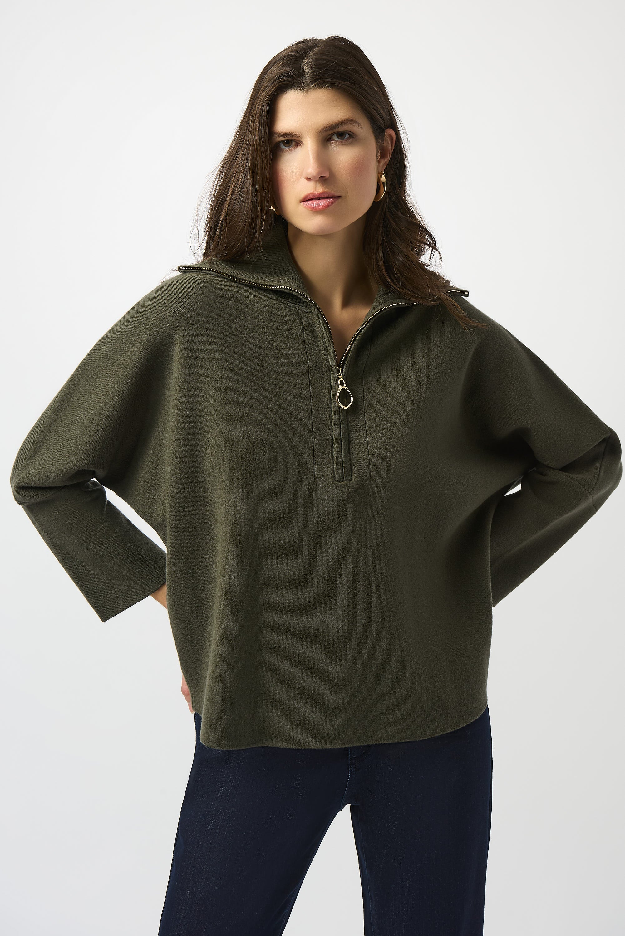Pearls Boutique Port Dover Ontario Joseph_Ribkoff_Sweater_Knit_Boxy_Pullover_With_Zipped_Collar_253963-Soft sweater knit pullover with a relaxed boxy fit, featuring a modern zipped front neckline and elegant three-quarter bell sleeves that add graceful movement to the silhouette. colour Avocado Green.


