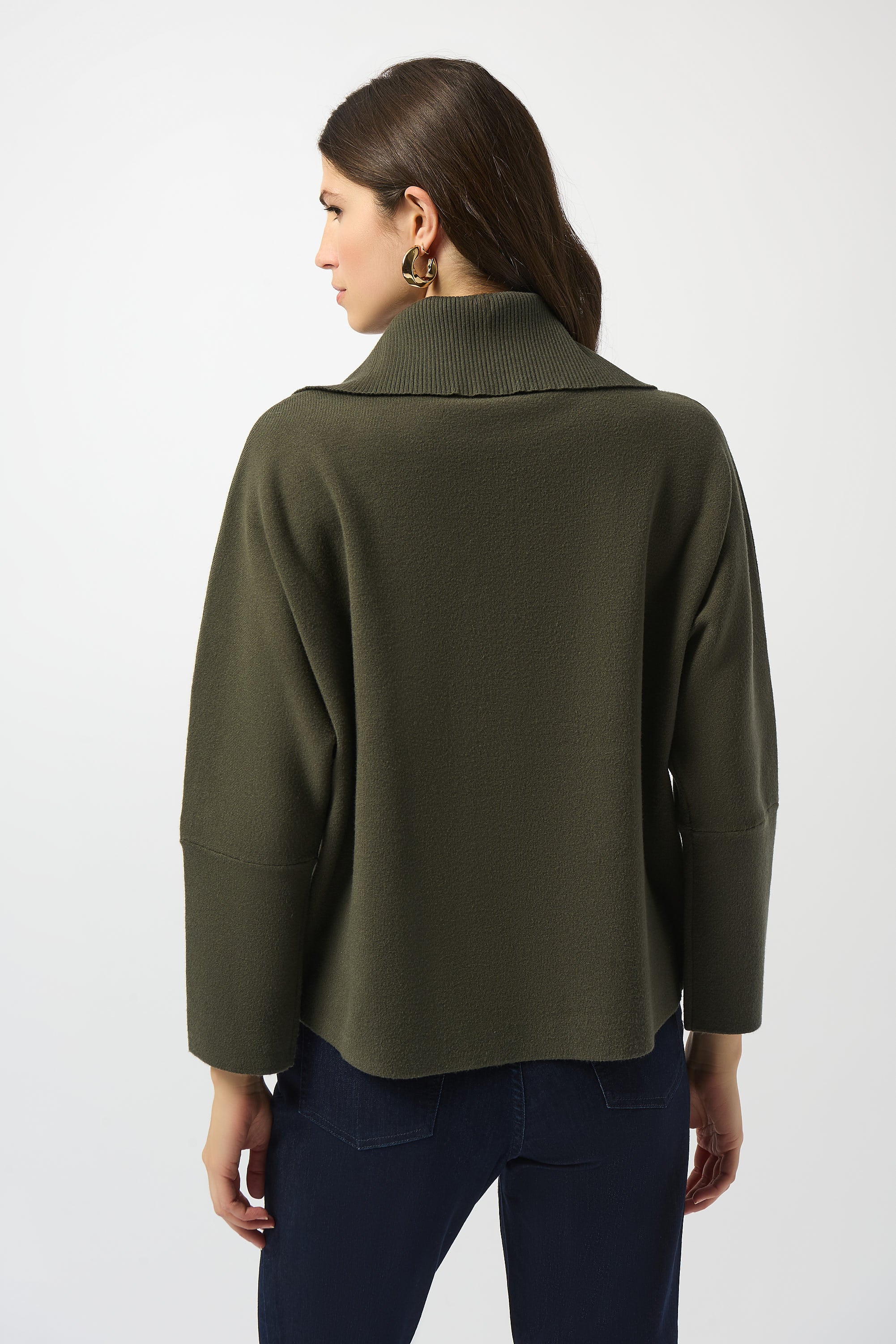 Pearls Boutique Port Dover Ontario Joseph_Ribkoff_Sweater_Knit_Boxy_Pullover_With_Zipped_Collar_253963-Soft sweater knit pullover with a relaxed boxy fit, featuring a modern zipped front neckline and elegant three-quarter bell sleeves that add graceful movement to the silhouette. colour Avocado Green.

