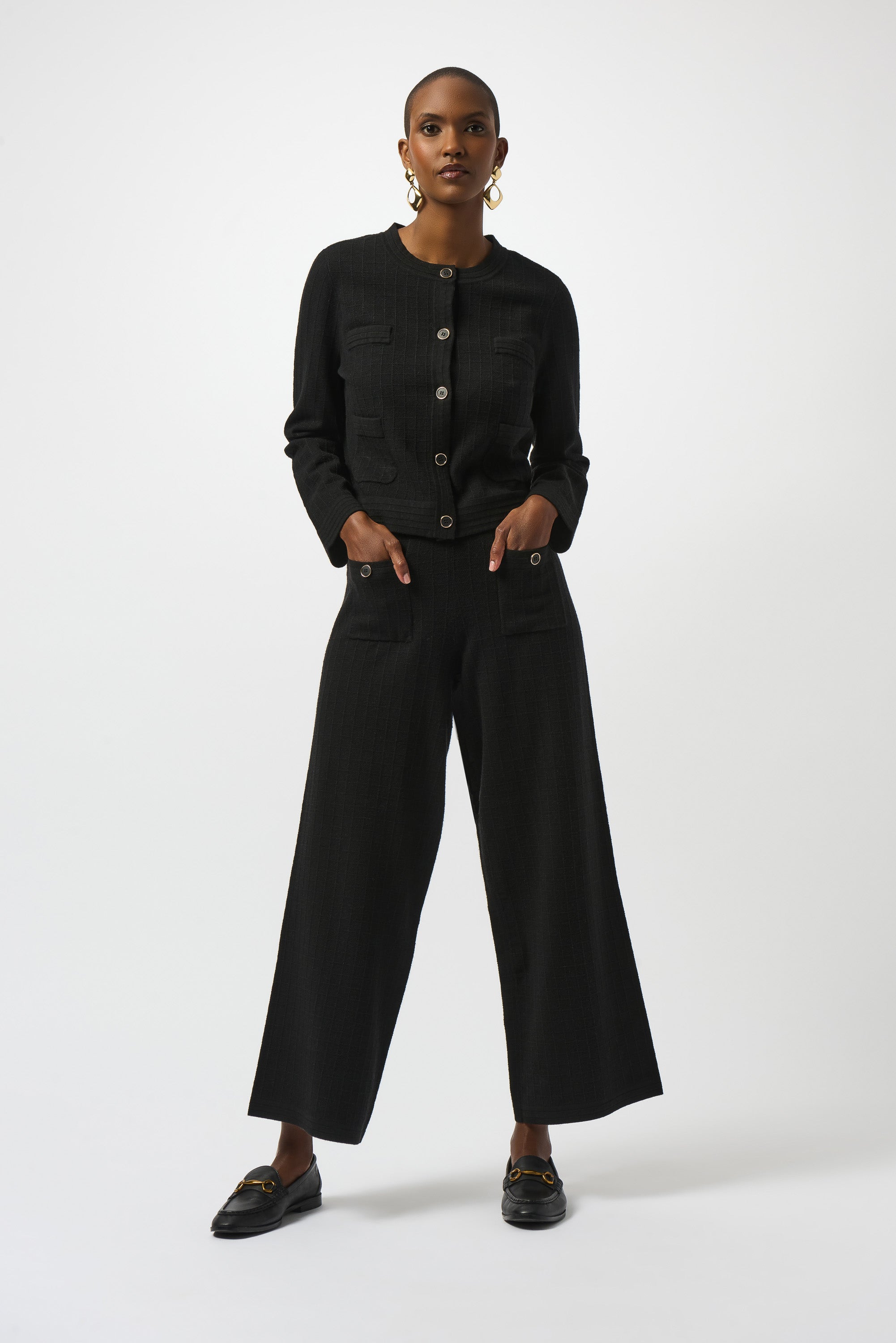 Pearls Boutique | Port Dover Ontario| Joseph Ribkoff | Sweater Knit Crew Neck Button-Front Jacket | 253983-11-1 Colour Black. Luxurious viscose-blend sweater knit with soft structure

Classic crew neckline for a sophisticated profile

Chic metal front button closure

Sleek patch pockets blending style and function

Straight long sleeves with a tailored finish

Lightweight and unlined for comfortable layering

