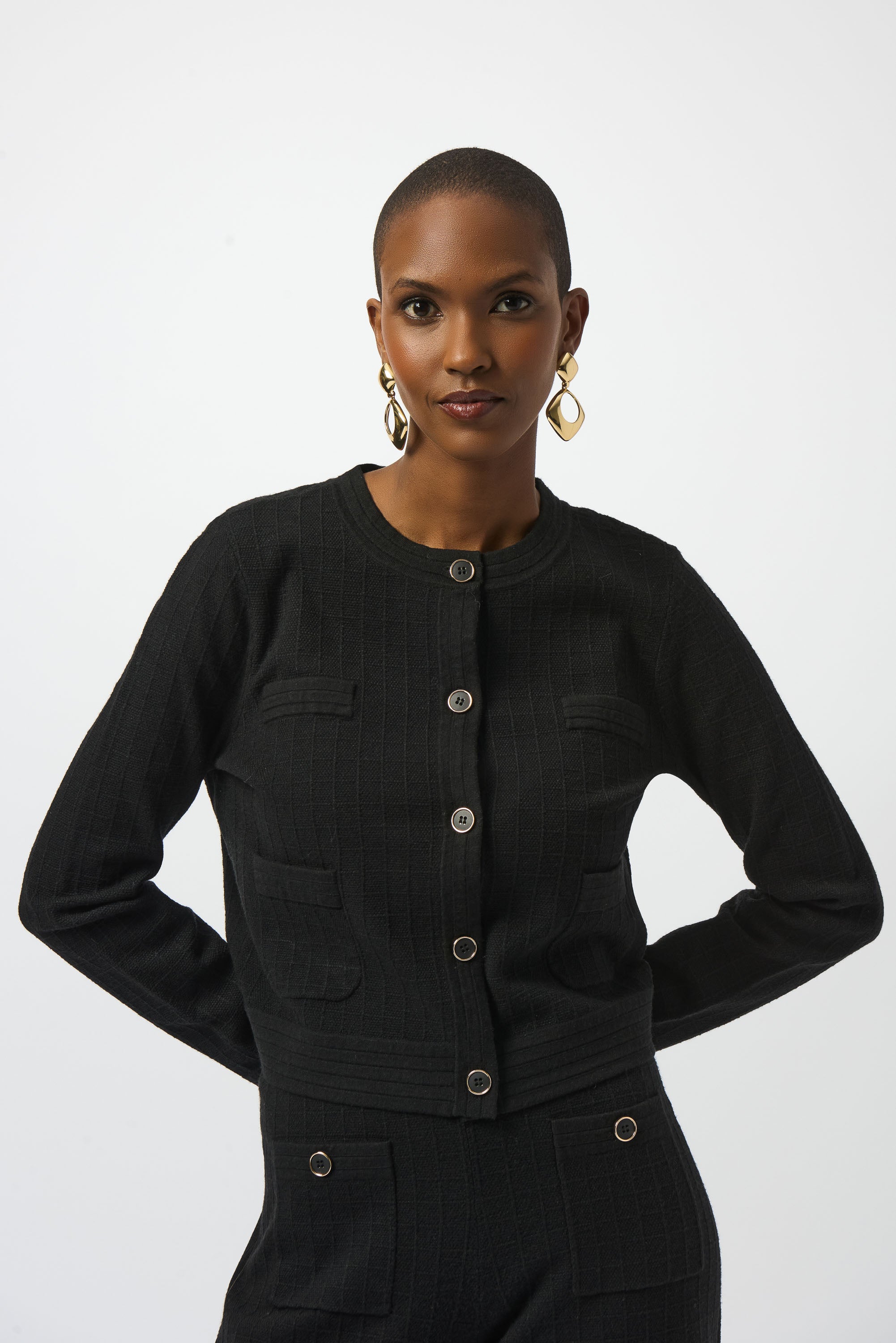 Pearls Boutique | Port Dover Ontario| Joseph Ribkoff | Sweater Knit Crew Neck Button-Front Jacket | 253983-11-1 Colour Black. Luxurious viscose-blend sweater knit with soft structure

Classic crew neckline for a sophisticated profile

Chic metal front button closure

Sleek patch pockets blending style and function

Straight long sleeves with a tailored finish

Lightweight and unlined for comfortable layering

