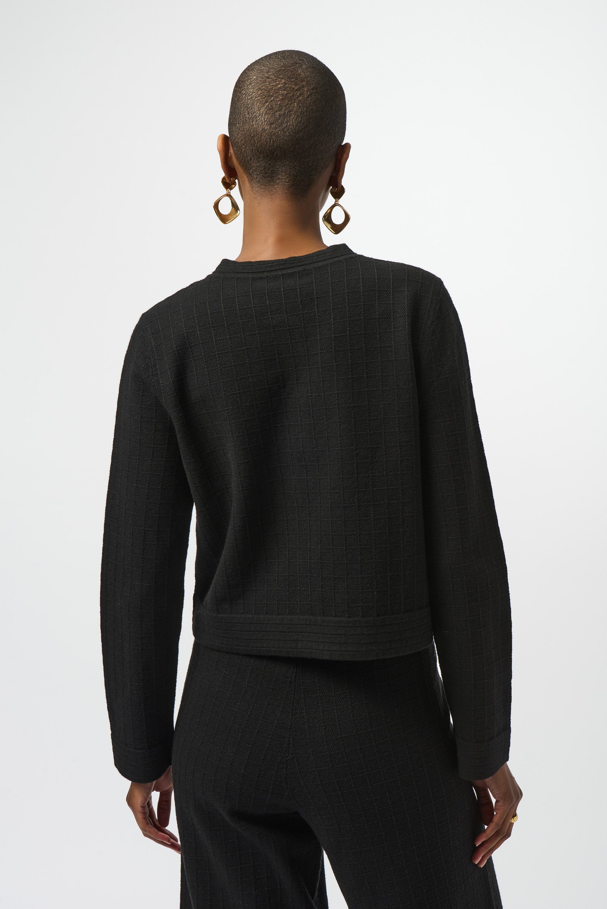 Pearls Boutique | Port Dover Ontario| Joseph Ribkoff | Sweater Knit Crew Neck Button-Front Jacket | 253983-11-1 Colour Black. Luxurious viscose-blend sweater knit with soft structure

Classic crew neckline for a sophisticated profile

Chic metal front button closure

Sleek patch pockets blending style and function

Straight long sleeves with a tailored finish

Lightweight and unlined for comfortable layering

