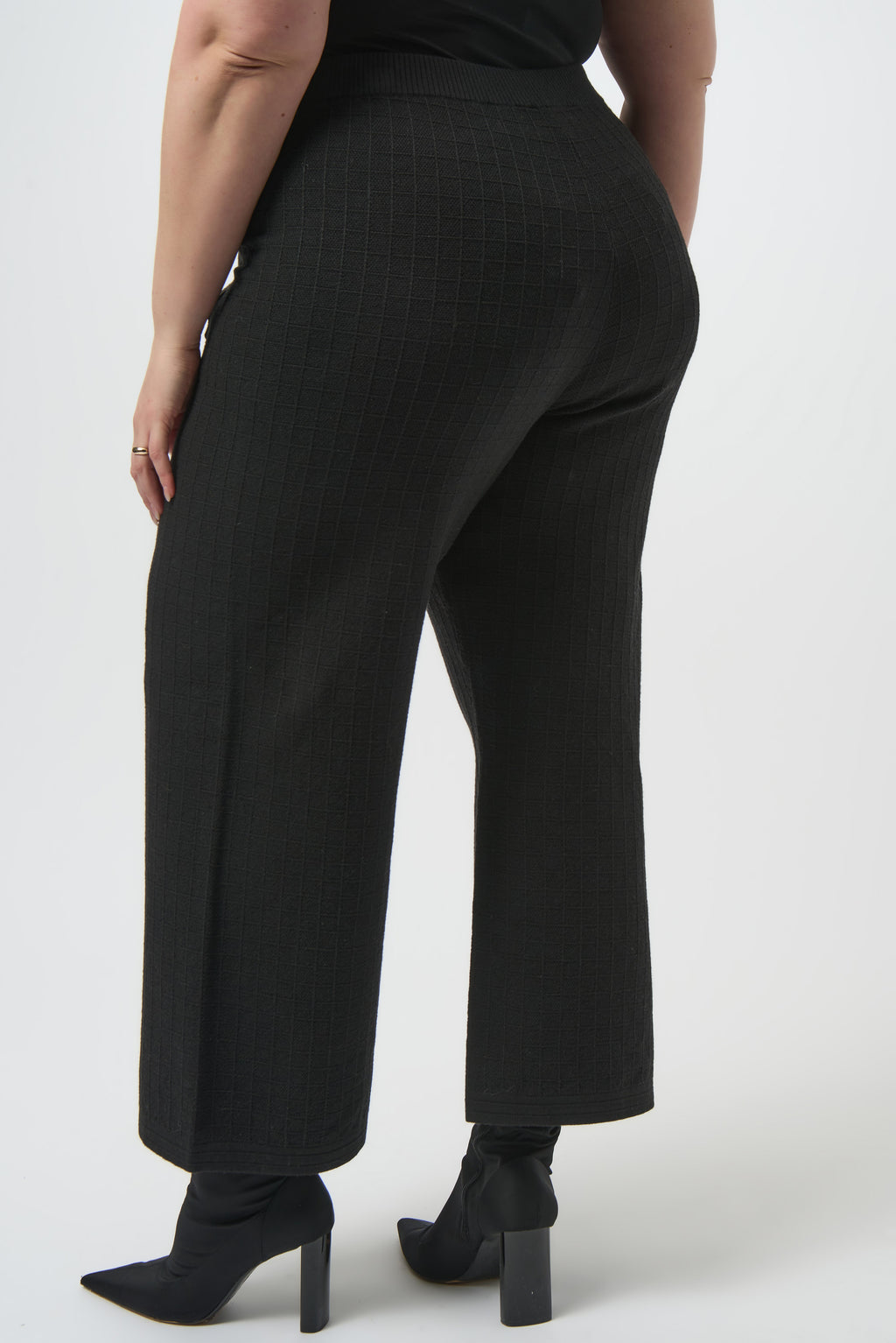 Pearls Boutique | Port Dover Ontario | Joseph Ribkoff | Sweater Knit Straight Leg Pants | 253984-11 | colour black. 
Pull one, high rise, straight leg, Luxe viscose-blend sweater knit for a soft, structured feel

High-rise pull-on waistband for seamless comfort and sleek lines

Straight-leg cut that elongates the silhouette

Front patch pockets for a modern tailored detail

Lightweight and unlined for breathable wear

50% Viscose Rayon, 28% Polyester, 22% Nylon