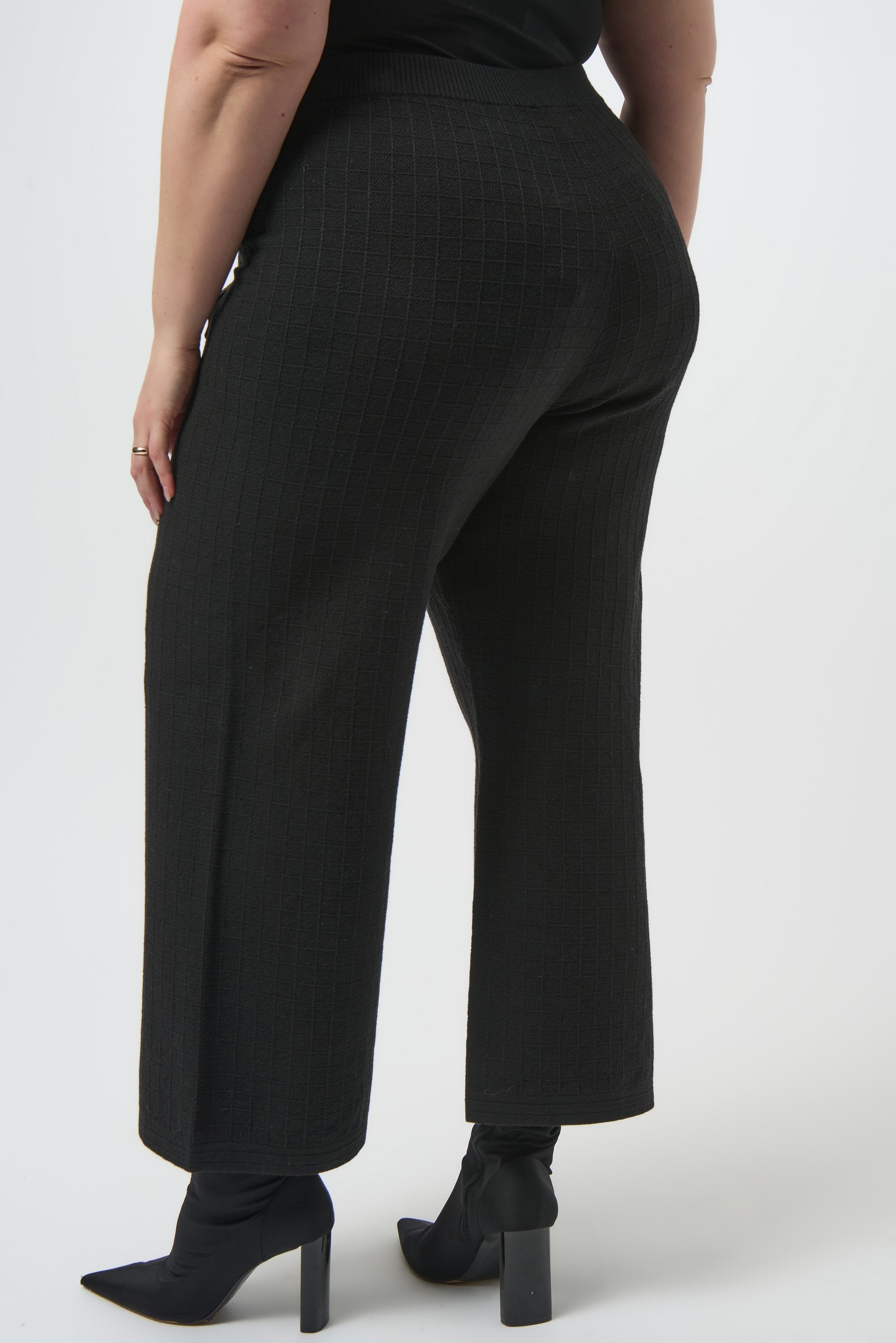Pearls Boutique | Port Dover Ontario | Joseph Ribkoff | Sweater Knit Straight Leg Pants | 253984-11 | colour black. 
Pull one, high rise, straight leg, Luxe viscose-blend sweater knit for a soft, structured feel

High-rise pull-on waistband for seamless comfort and sleek lines

Straight-leg cut that elongates the silhouette

Front patch pockets for a modern tailored detail

Lightweight and unlined for breathable wear

50% Viscose Rayon, 28% Polyester, 22% Nylon