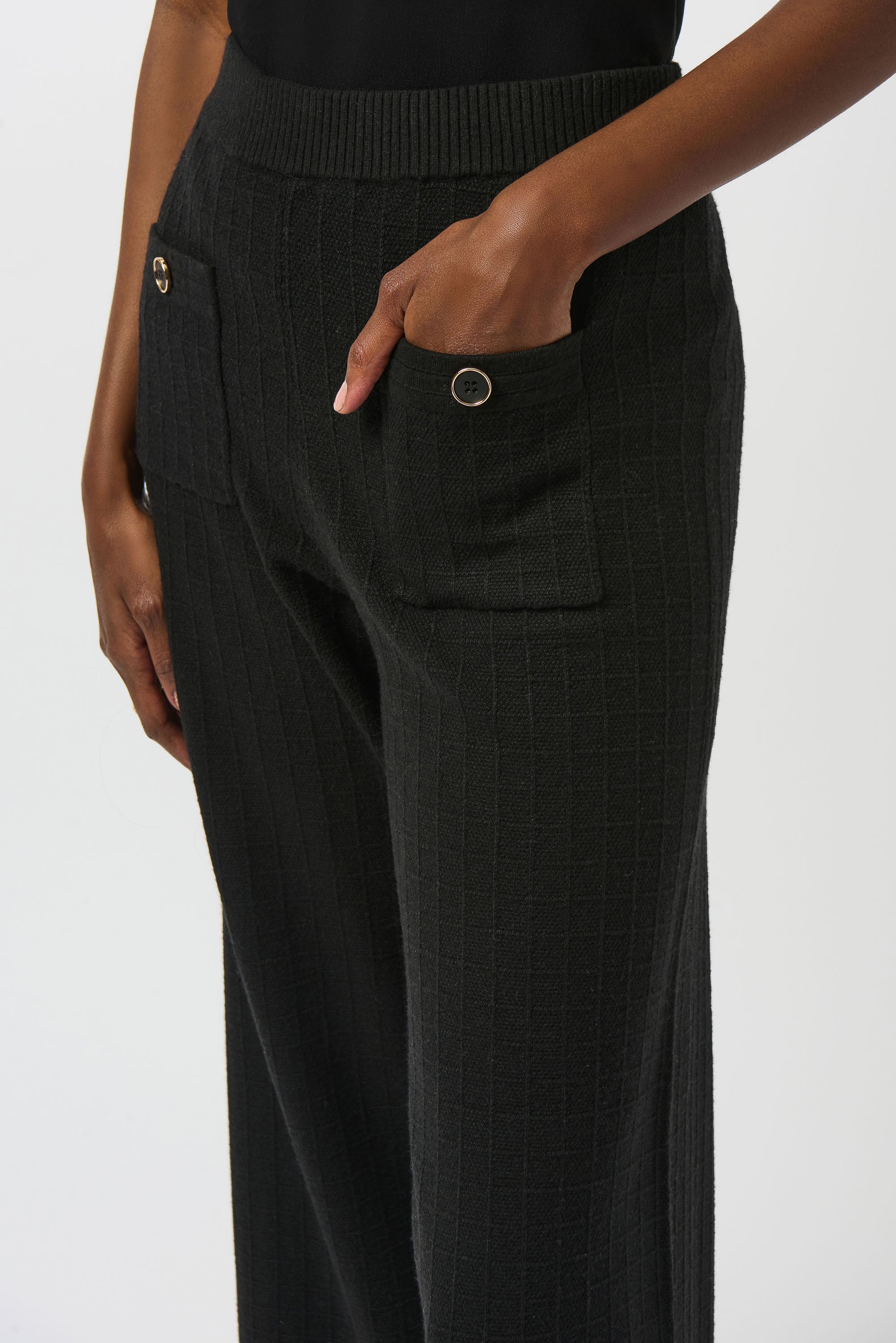 Pearls Boutique | Port Dover Ontario | Joseph Ribkoff | Sweater Knit Straight Leg Pants | 253984-11 | colour black. 
Pull one, high rise, straight leg, Luxe viscose-blend sweater knit for a soft, structured feel

High-rise pull-on waistband for seamless comfort and sleek lines

Straight-leg cut that elongates the silhouette

Front patch pockets for a modern tailored detail

Lightweight and unlined for breathable wear

50% Viscose Rayon, 28% Polyester, 22% Nylon