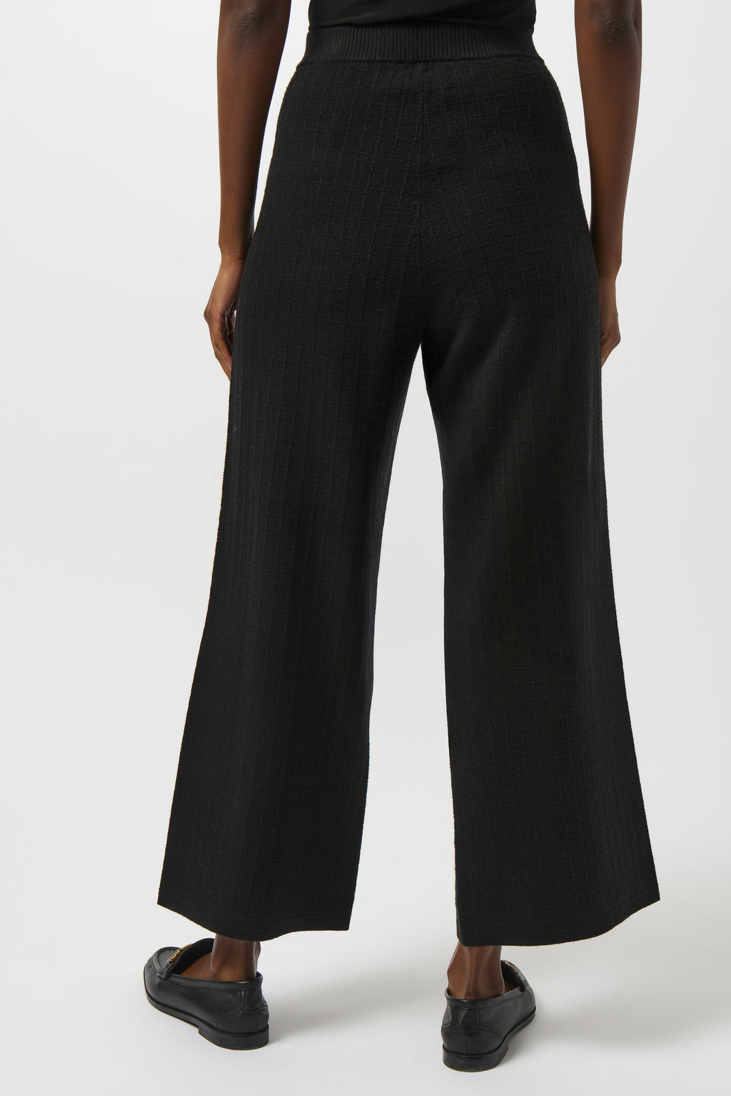 Pearls Boutique | Port Dover Ontario | Joseph Ribkoff | Sweater Knit Straight Leg Pants | 253984-11 | colour black. 
Pull one, high rise, straight leg, Luxe viscose-blend sweater knit for a soft, structured feel

High-rise pull-on waistband for seamless comfort and sleek lines

Straight-leg cut that elongates the silhouette

Front patch pockets for a modern tailored detail

Lightweight and unlined for breathable wear

50% Viscose Rayon, 28% Polyester, 22% Nylon