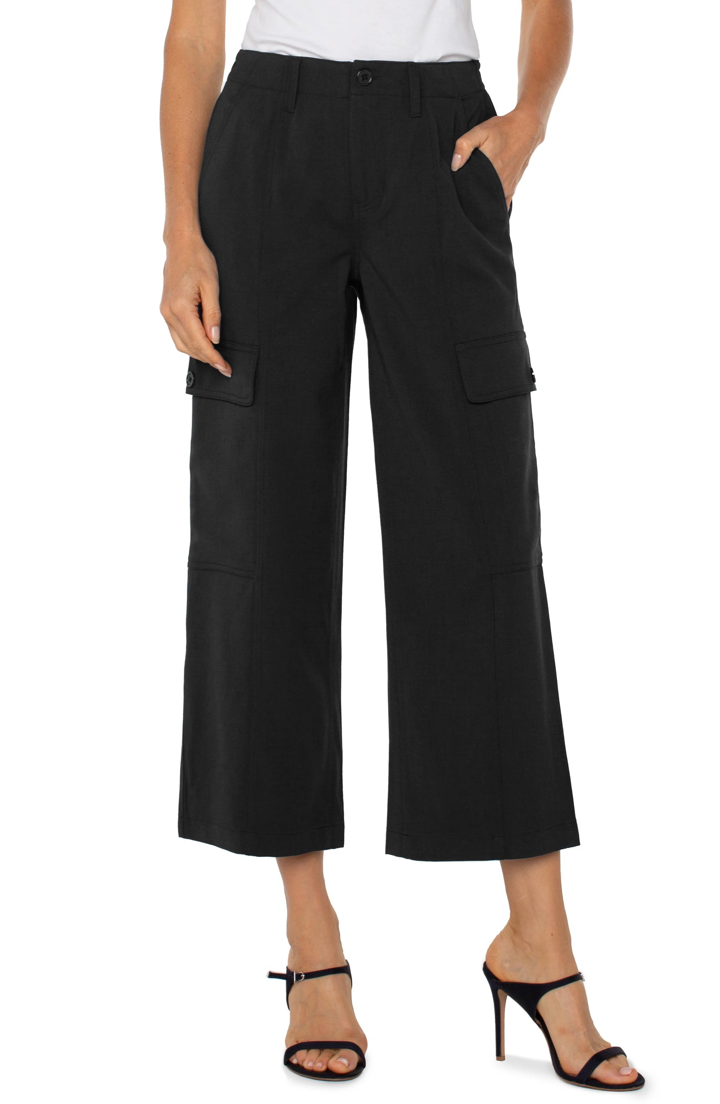 Pearls Boutique | Port Dover Ontario Liverpool | Hi-rise cargo crop pants |  in black textured stretch-woven fabric

Straight-leg silhouette with a flattering fit

Elastic back waistband for added comfort

Zip-fly with single button closure

Slash side pockets and back flap pockets with button closures

Cargo side pockets with button closures

26" inseam, 10-1/8" front rise, 19-3/4" leg opening

Lightweight and durable fabric (47% Rayon, 50% Polyester, 3% Spandex)