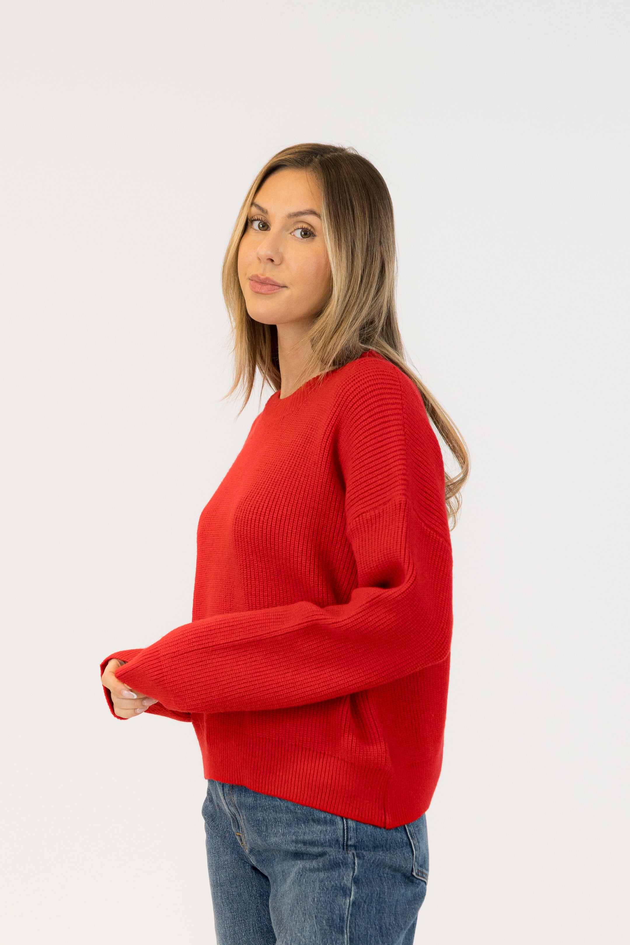 Pearls Boutique| Port Dover Ontario|Lyla + Lux | Avery Crewneck Sweater|Lyla + Lux women’s heavyweight ribbed crewneck sweater, soft, structured blend of viscose, polyester, and polyamide, classic crew neckline, long sleeves, and an all-over ribbed texture that adds depth and sophistication. Relaxed fit, dropped shoulder. Colour Red.