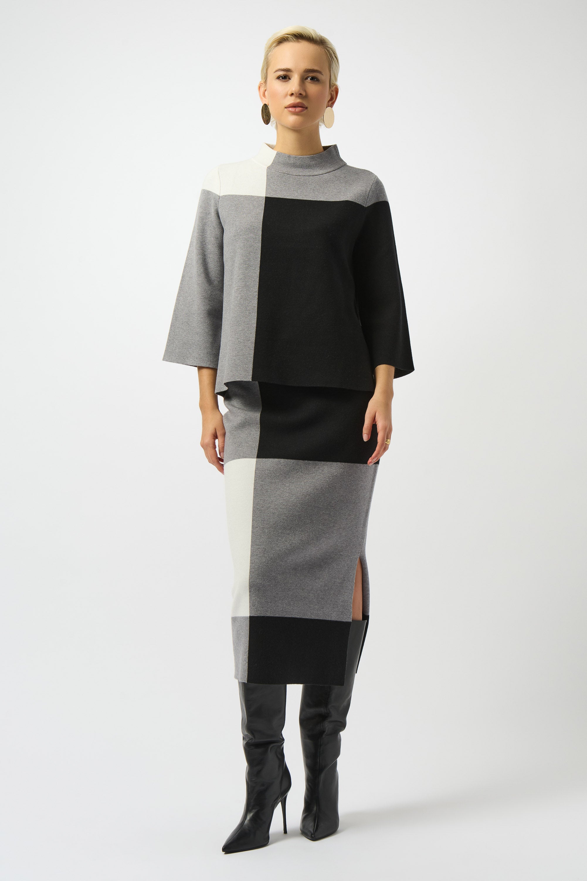 Pearls Boutique | Port Dover Ontario | Joseph Ribkoff Jacquard Sweater | Colour Block Pullover | colour Black/white/grey.
Soft jacquard sweater knit with rich texture and drape
Statement colour-block print for a modern, artistic edge
Classic crew neckline for timeless appeal
Three-quarter straight sleeves for an elegant, everyday fit