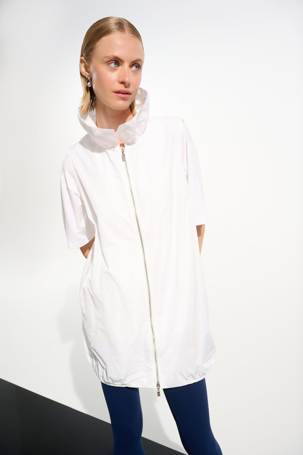 White nylon zip up sleeveless jacket by Joseph Ribkoff, available at Pearls Boutique in Port Dover, Ontario.